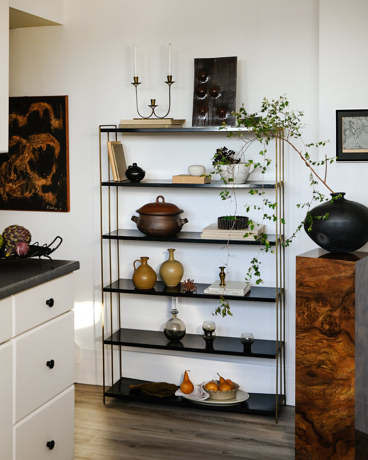 Kitchen bookshelf with found objects