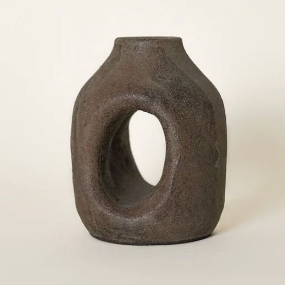 vase with hole in the middle
