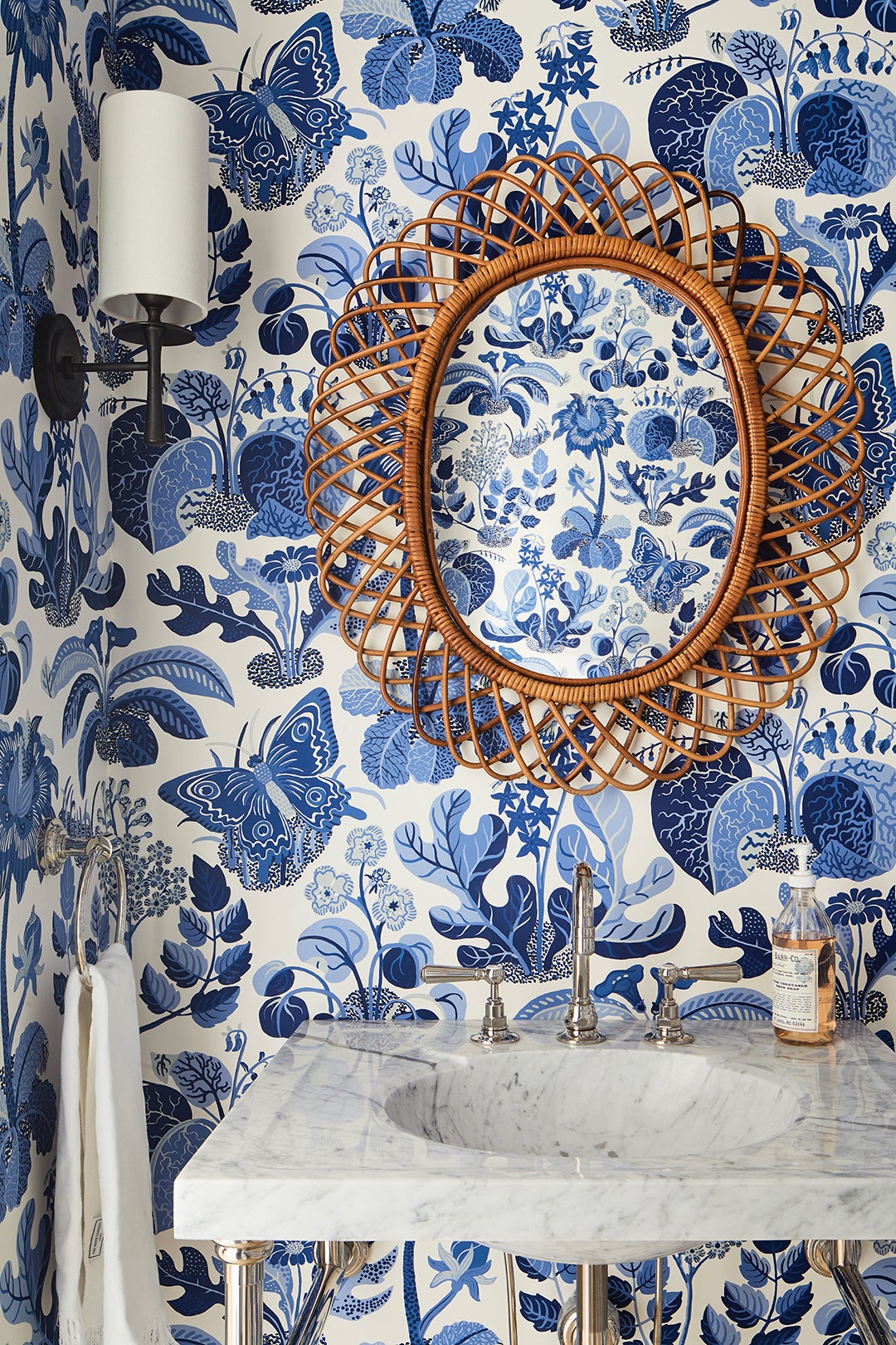 Bathroom with blue and white wallpaper