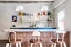 Bar counter with blue grout and custom barstools