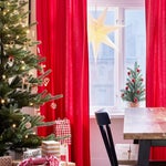red curtains near tree