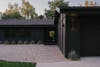 Modern home with black exterior paint.