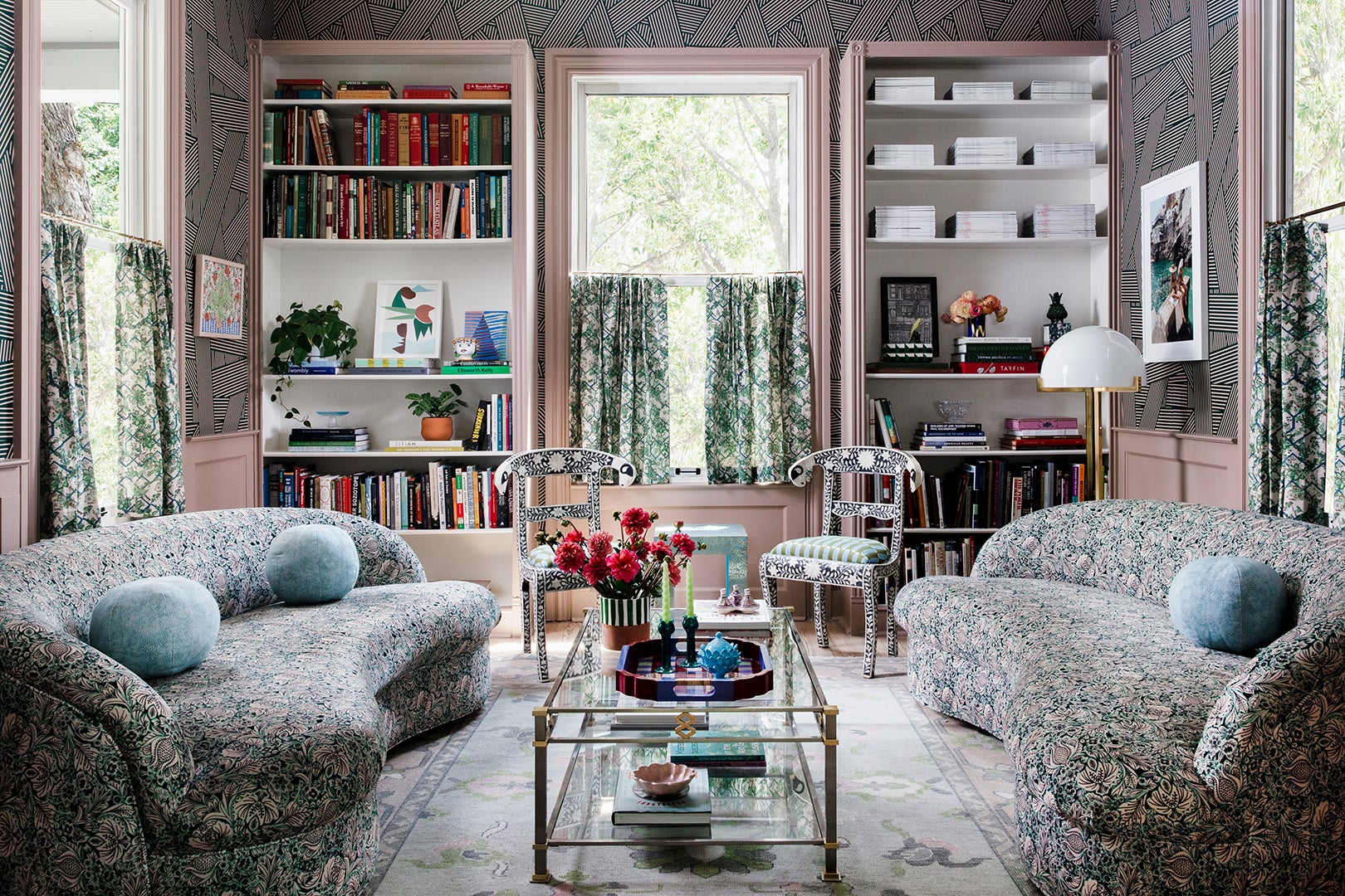 pink library with floral sofas