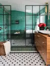 green shower with black framed doors