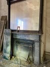 Before photo of old fireplace