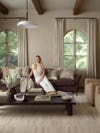 Portrait of designer Amber Lewis in styled living room