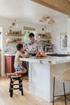 woman in kitchen with son