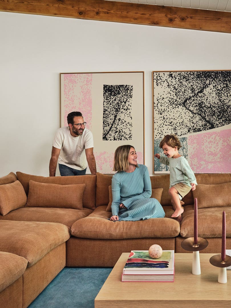 Family on a tan sofa