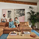 Family on a tan sofa