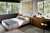 Bedroom with wooden bedframe