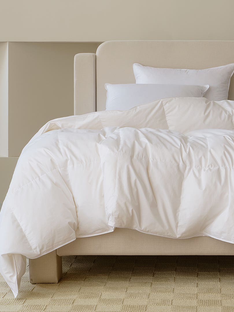 Bed with duvet insert on top