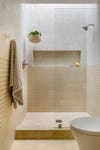 yellow striped shower tile
