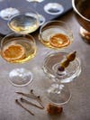 Champagne cocktails with garnishes