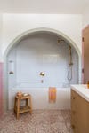 arched shower-tub nook
