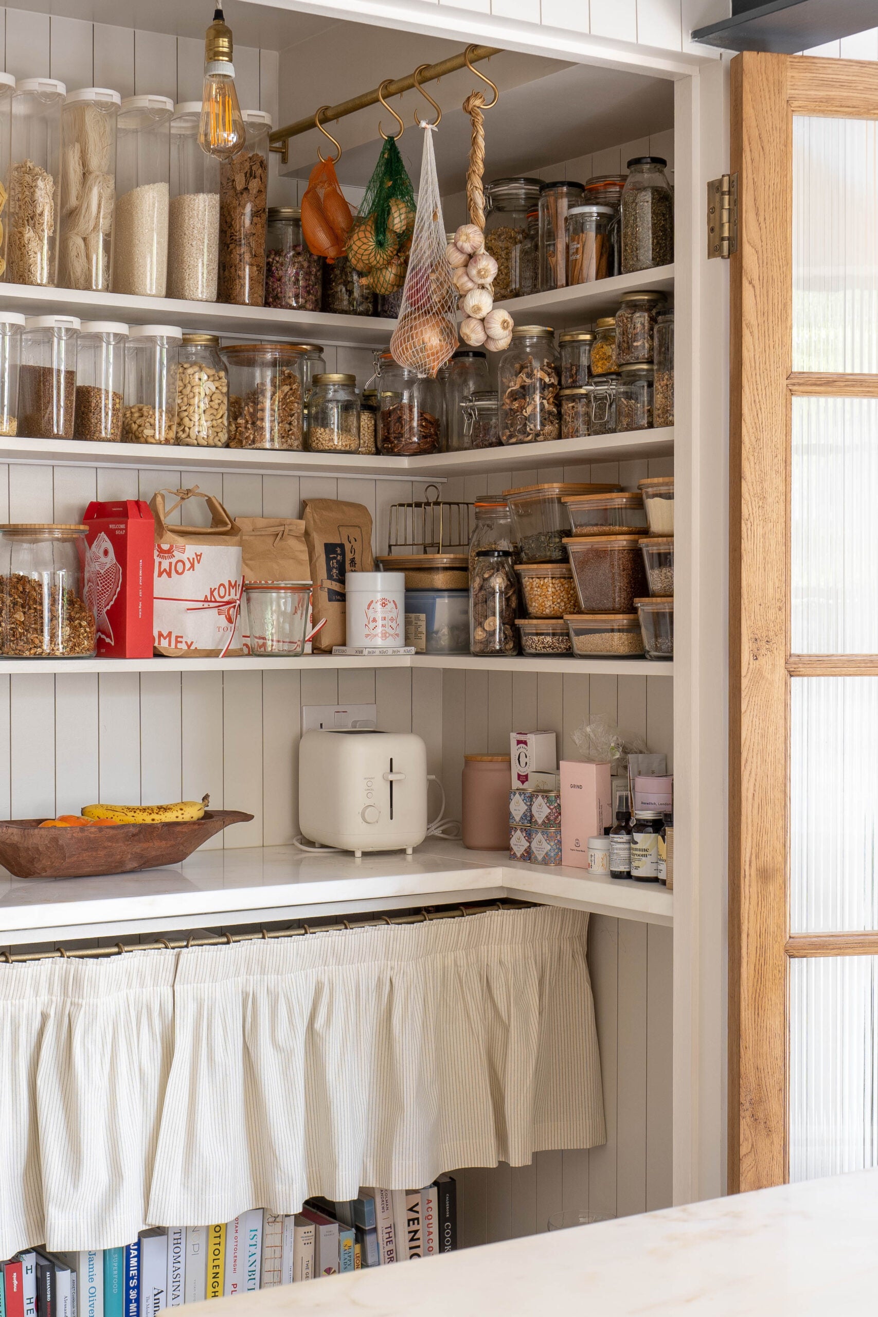 pantry with jars lining shelves
