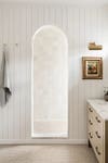 archway leading into shower