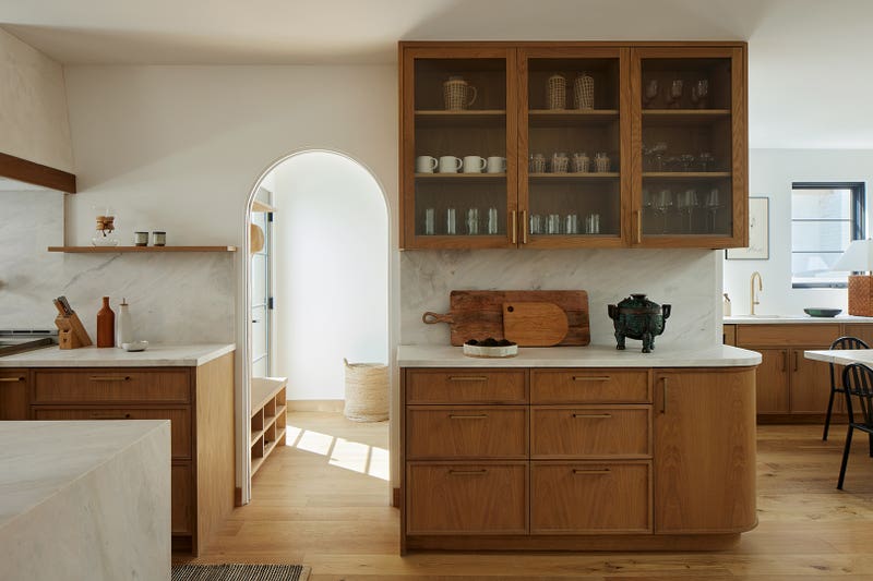 Everything in This Home’s ADU Can Be Hidden Within a Wall of Cabinets