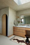 bathroom with arched doorway