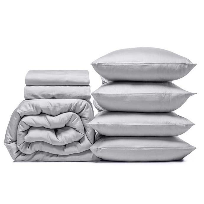 stack of gray bedding