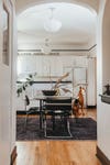 White kitchen cabinets with dog statue