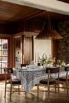 Dining table with blue floral tablecloth