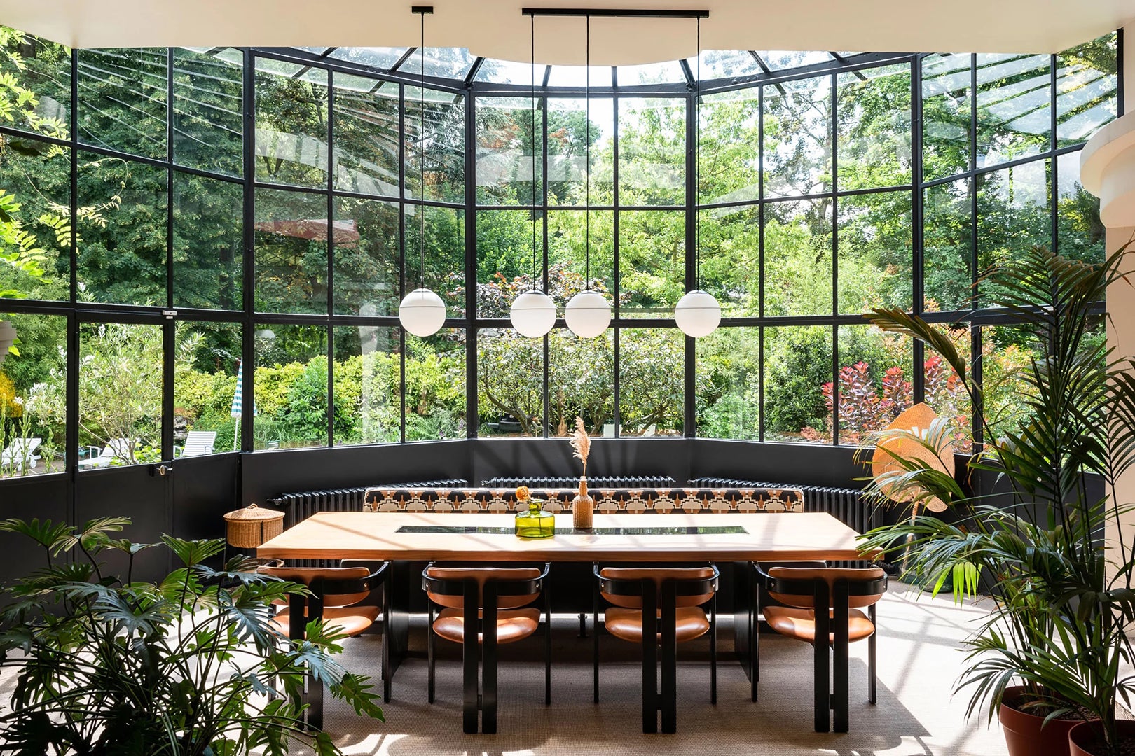 dining room with curved wall-to-wall windows