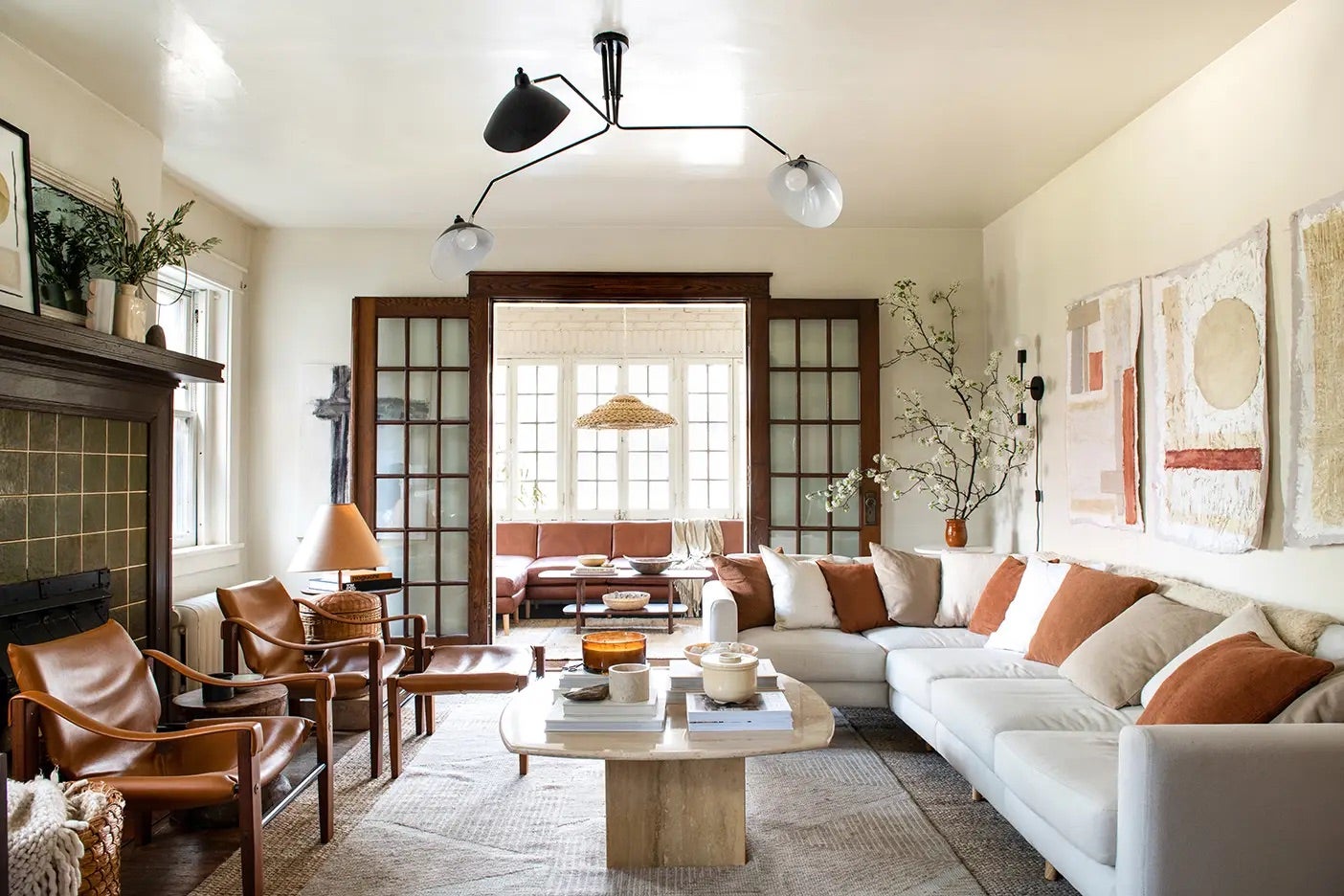 two living rooms connected by french doors