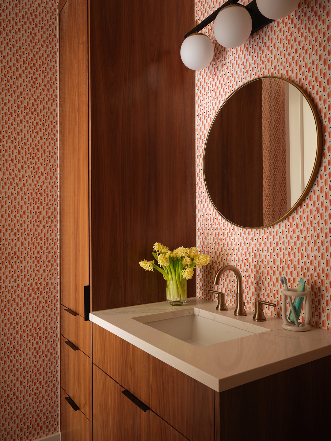 red wallpapered bathroom