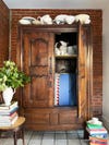 antique wood cabinet with door open