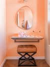 Floating desk with x stool and organic shaped mirror