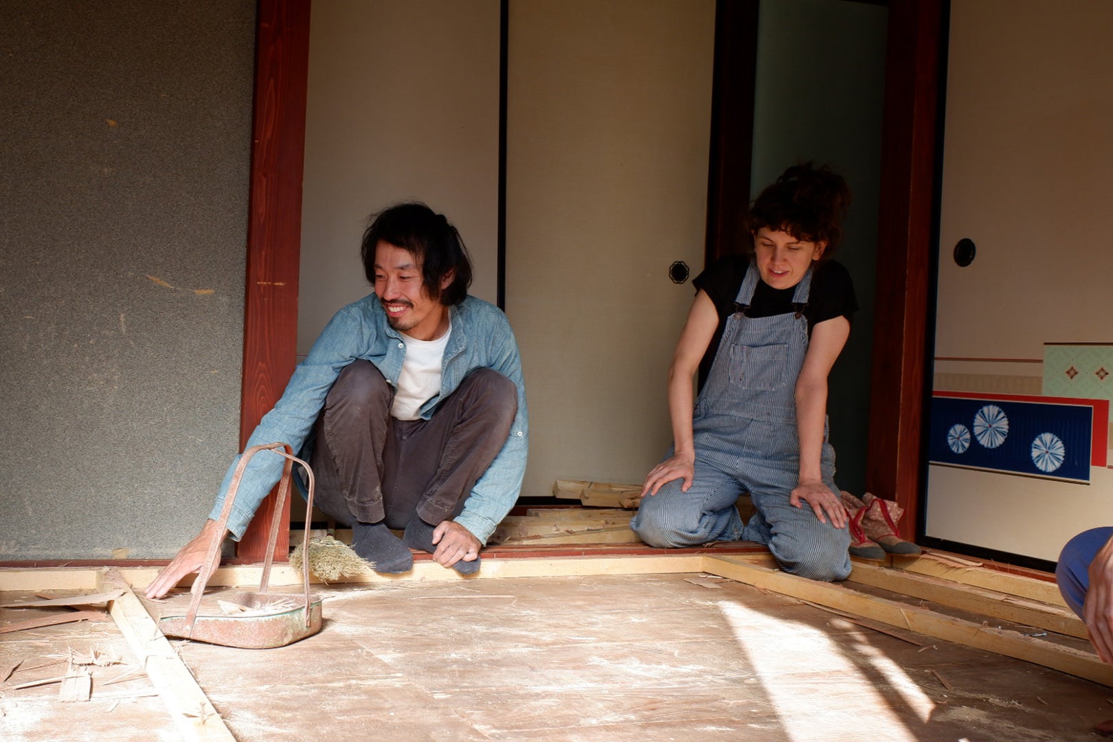 man and woman working on floors