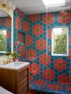 Primary bathroom with daisy-patterned tile