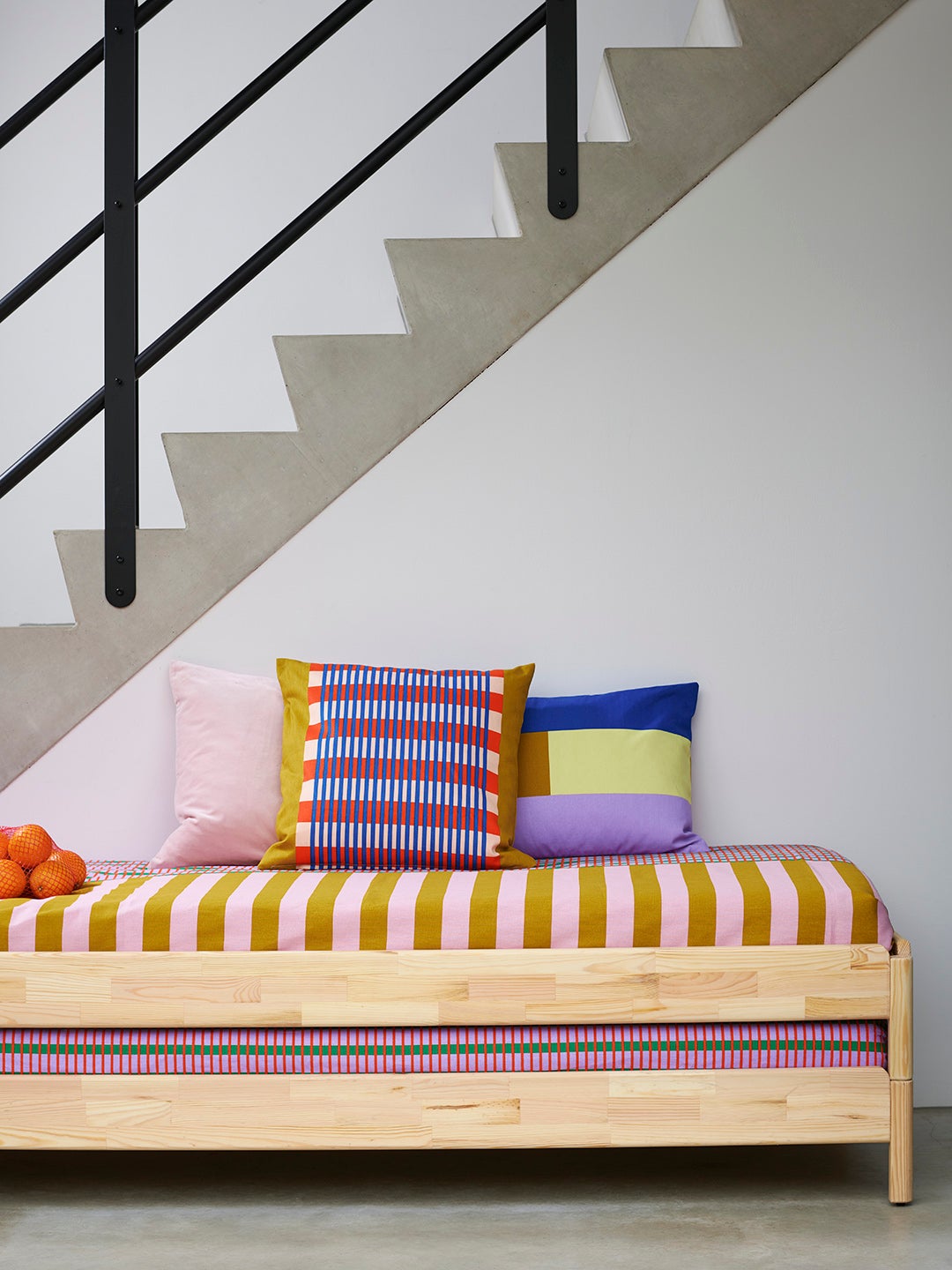 bench with striped pillows