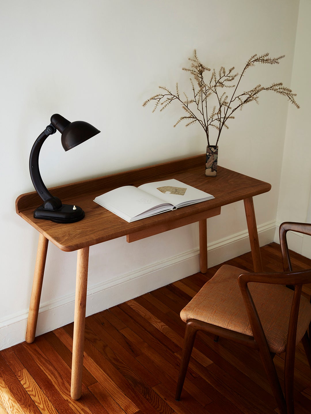 desk with black lamp