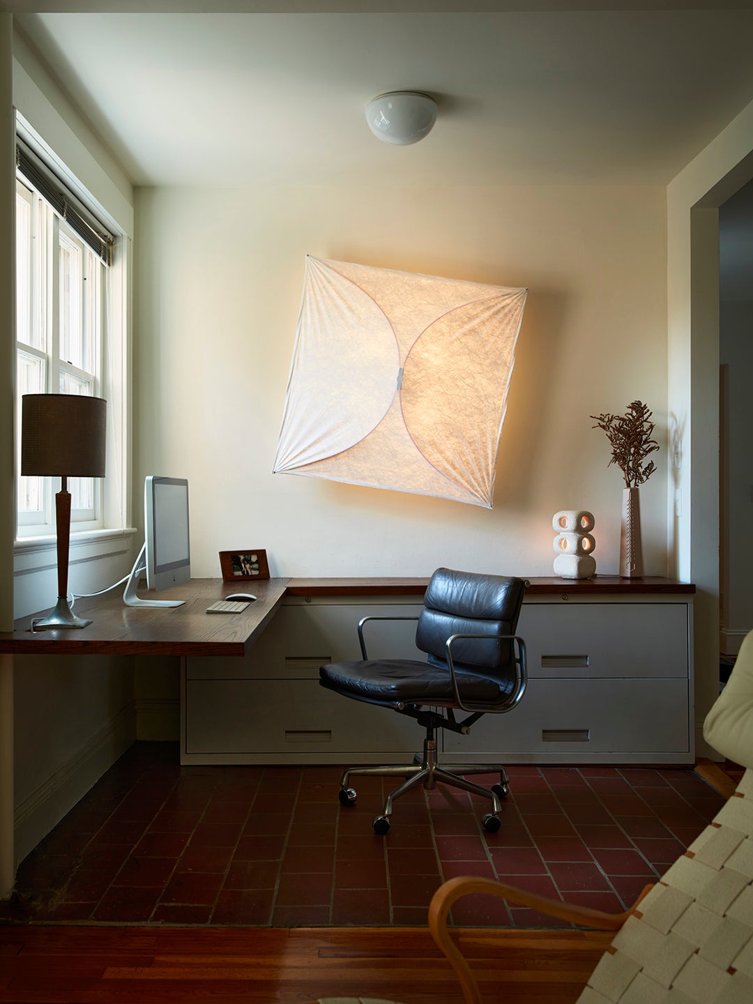 paper wall light over desk