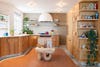 kitchen with sculptural wood island