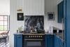 navy blue kitchen with shiplap