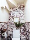 bathroom with stone wallpaper