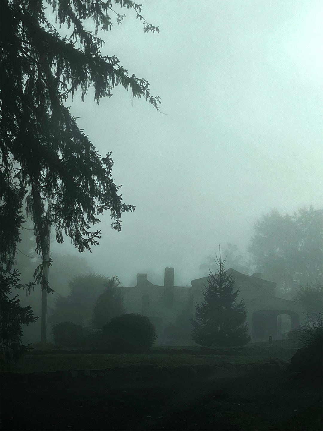 Spooky looking house in the mist