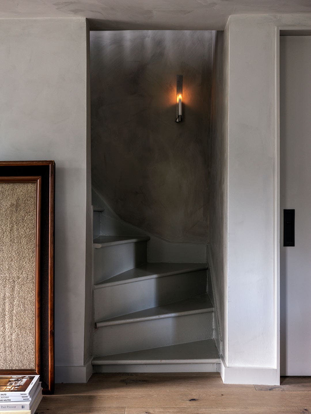 Narnia Who? This Cottage’s Attic Doors Reveal a Dramatic Marble Shower