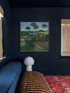 bedroom in dark blue paint with painting of a tropical scene