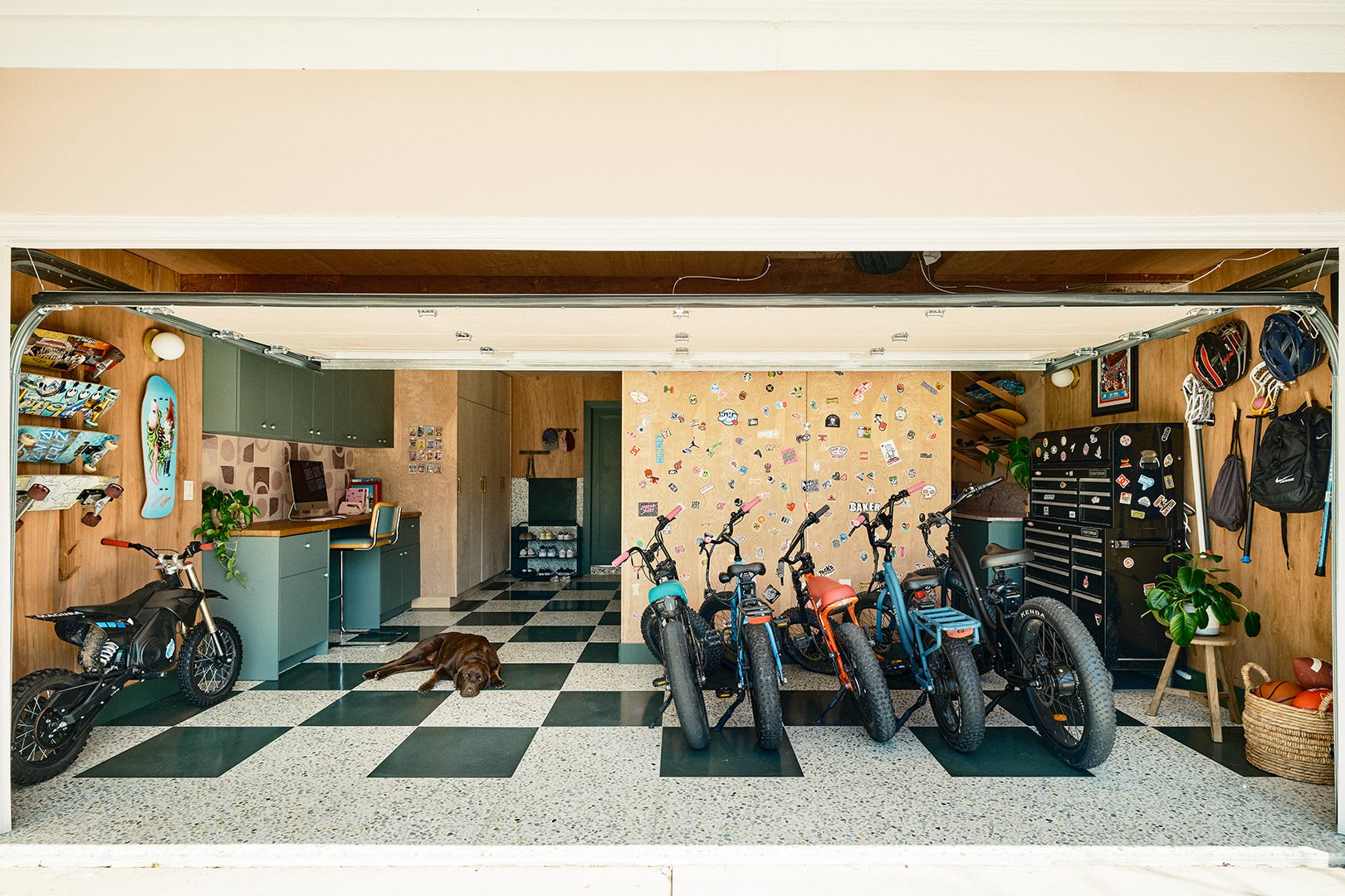 Motorbikes lined up on terrazzo floors in a garage