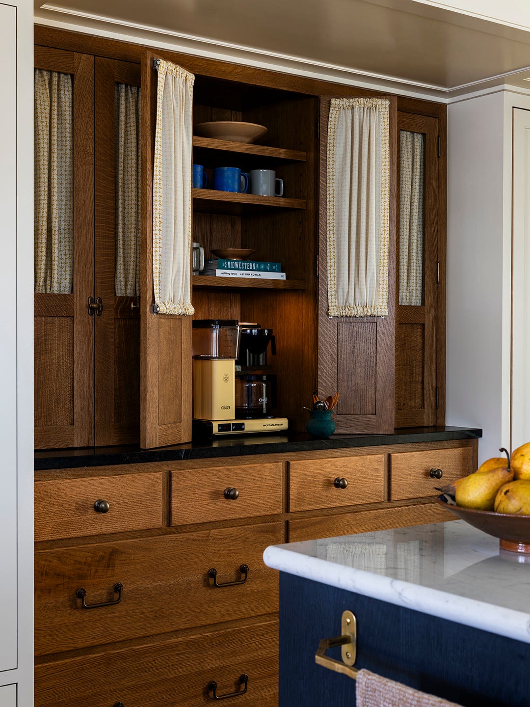 wood cabinets with fabric doors