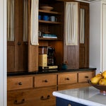 wood cabinets with fabric doors