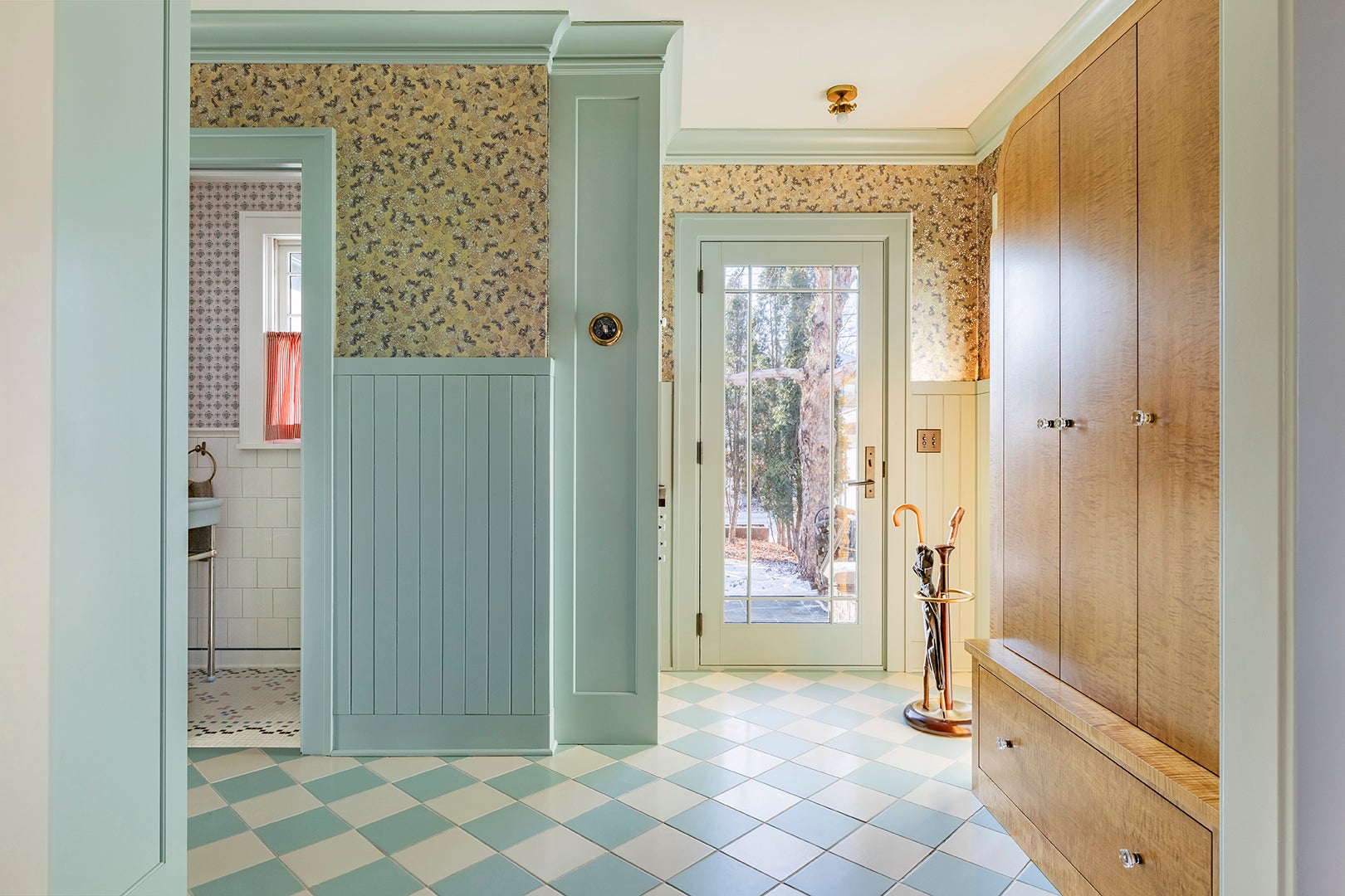 light blue mudroom with checkered floor