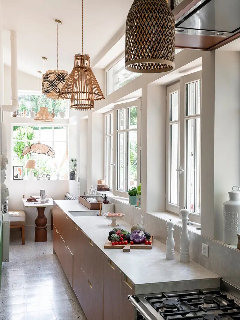 galley kitchen with woven pendants