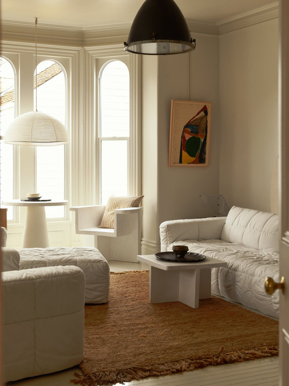 living room with neutral and white colors