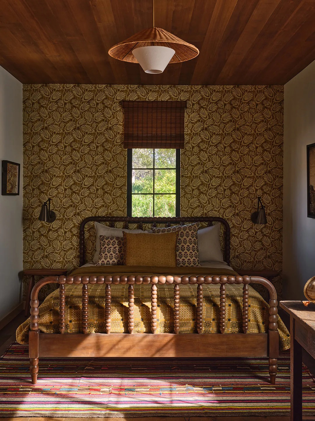 bed in front of window 