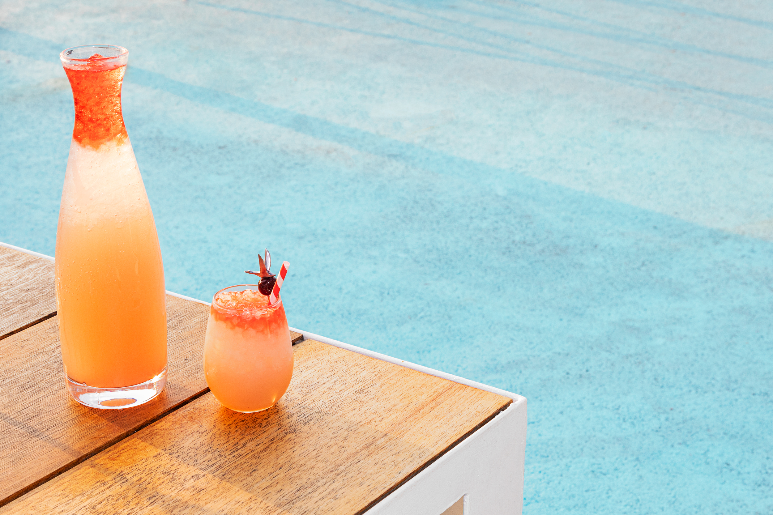 cocktail in glass and carafe