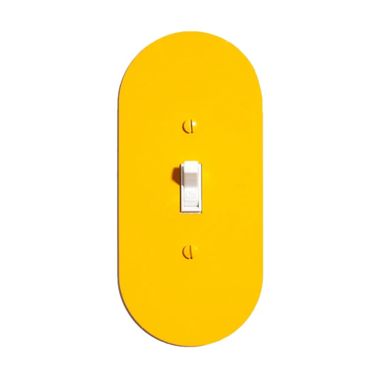 pill-shaped yellow light switch
